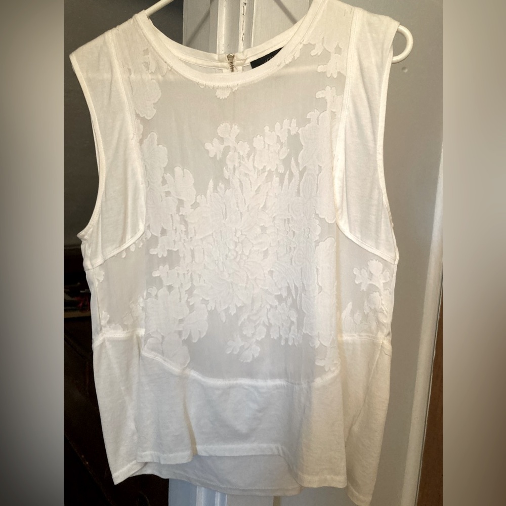JCREW sleeveless blouse. Silk/cotton front and polyester center backside.